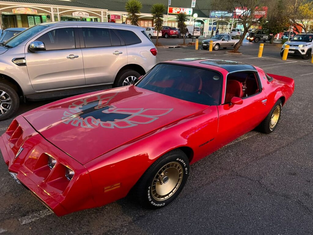 Johnny Dust Red Pontiac Transam