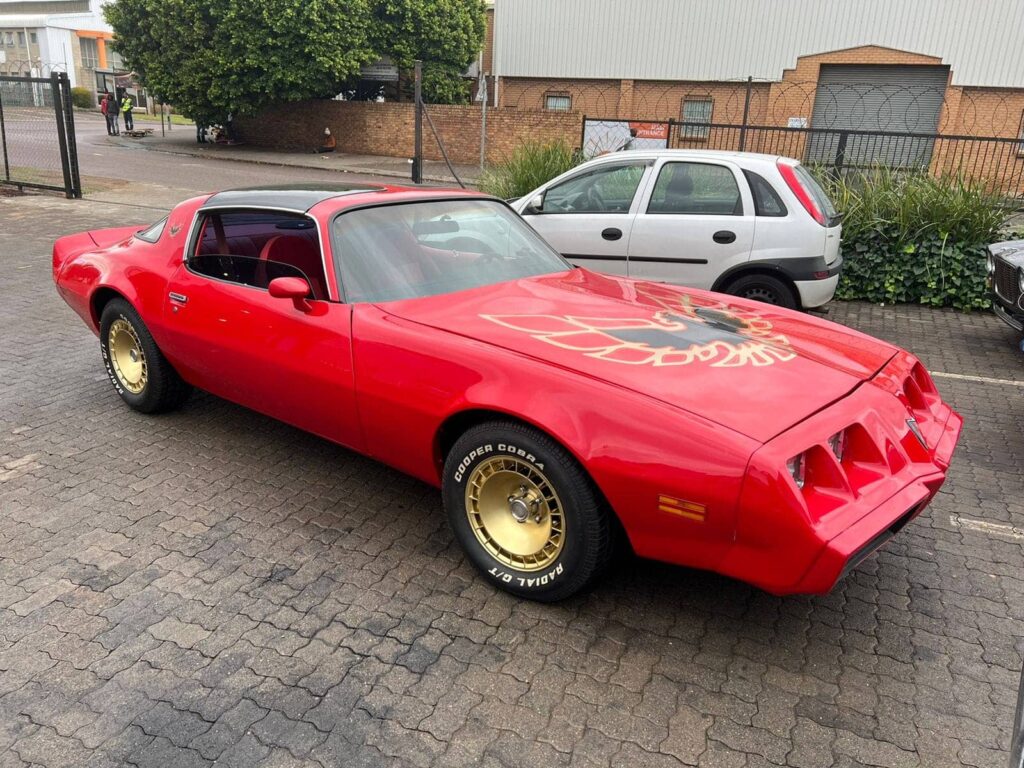 Johnny Dust Red Pontiac Transam